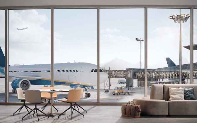 Infraestructura inmobiliaria Foto de la sala de un aeropuerto con comedor y sofá, a través del ventanal se ve la pista de aterrizaje.